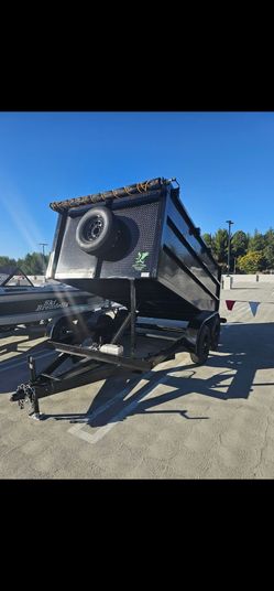 NEW DUMP TRAILERS 12x8x4 ROLLING TARP AND SPARE TIRE 2026 YEAR ELECTRIC BRAKES LIGHTS REMOTE CONTROL TITLE IN HAND READY FOR WORK,se habla ESPAÑOL