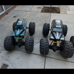2 monster trucks/ And 4 sharks asking $10 each no remote my kids lost as is all working 