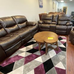 Madrid two-piece sofa loveseat recliner in living room $1099 with easy finance