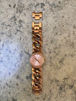 Michael Kors women’s rose gold three hand watch
