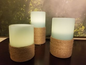 3 blue electric wax pillar candles with twine