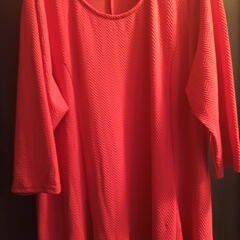 A women peach/light orange dress avenue