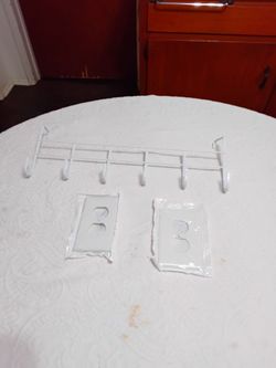 White Wall Hook Rack and Outlet Cover Plates