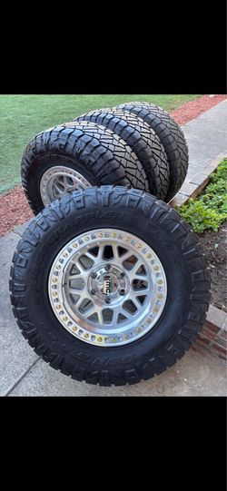 KMC new on used tires 285/70/17 wheels and tires offset 0