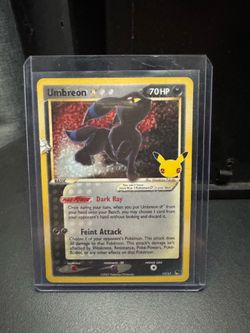 Pokemon cards Umbreon, Charizard and Gengar
