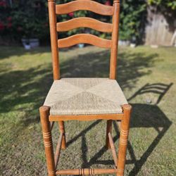 Wooden ladderback share with rush, woven straw seat, very good condition.$ 75 OBO ventura county