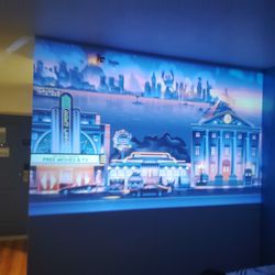 PORTABLE PROJECTOR WITH ROKU