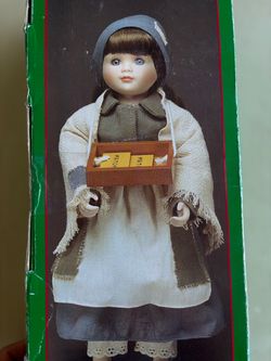 Porcelain Girl Doll with Match Seller Outfit