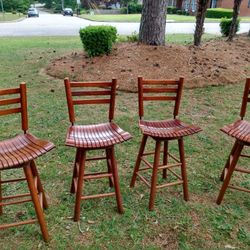 Four Counter Wood Swivel Chairs