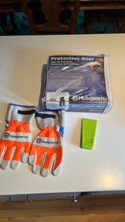 Husqvarna chainsaw chaps, gloves and widget.