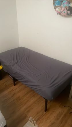 Twin size mattress + basic metal frame