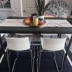Black bar height table and chairs