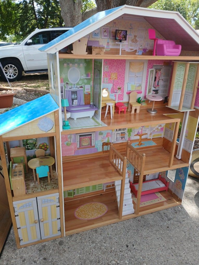 4 Foot Tall Doll House With Furniture.