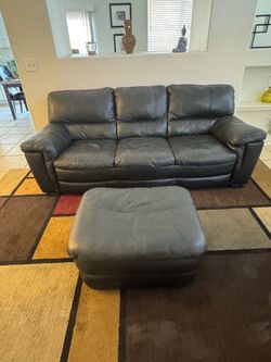 Genuine leather 3 people sofa in good condition.