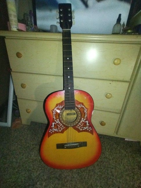 Acoustic guitar With Trump Sign Inside
