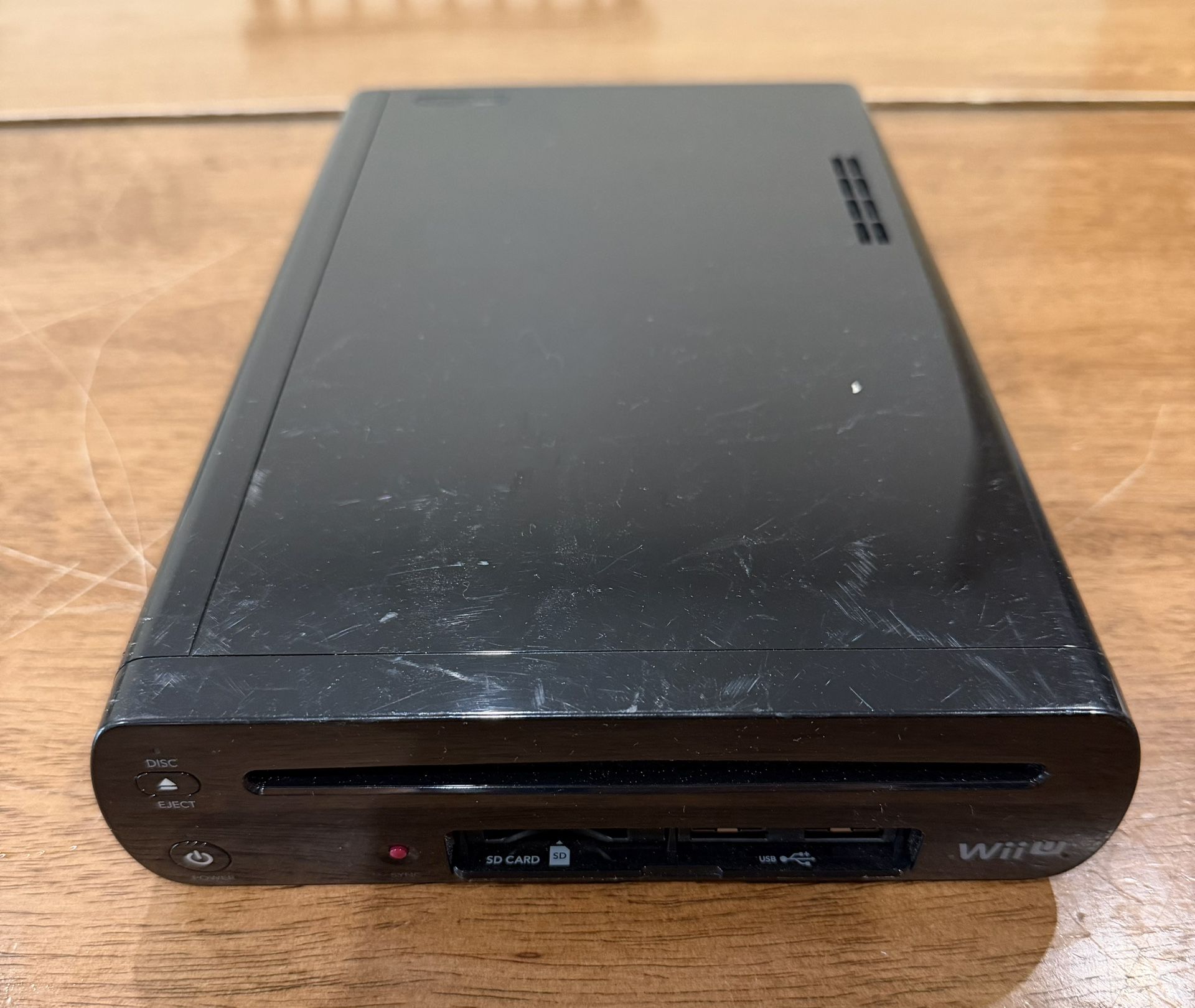 Nintendo Wii U Deluxe 32GB Handheld System Black with 4 Digital Games