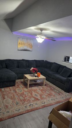 Ashley sectional Couch,  TV 58inchs, TV Stand, Freezer and Dinning Table 4 Chairs