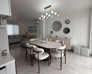 Oval Dining Table with 8 Boucle Chairs
