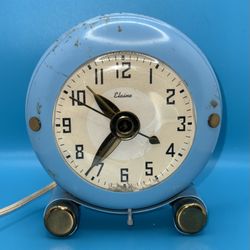 Elaine electric alarm clock. These clocks were popular in the mid-20th century and are now considered collectibles.