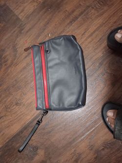 Oversized coach wrist bag