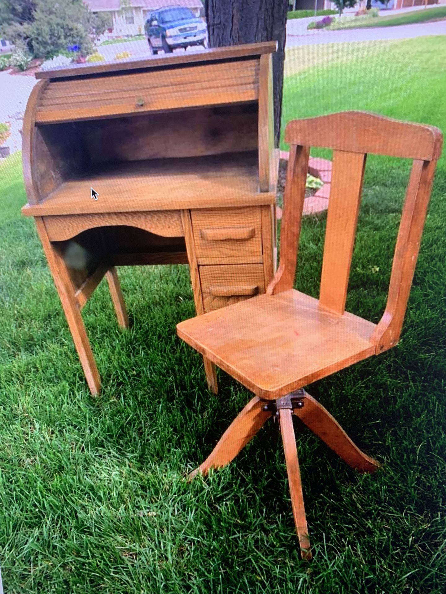 Antique child’s oak roll top desk and chair $89