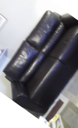 Hide a bed Leather couch and coffee table