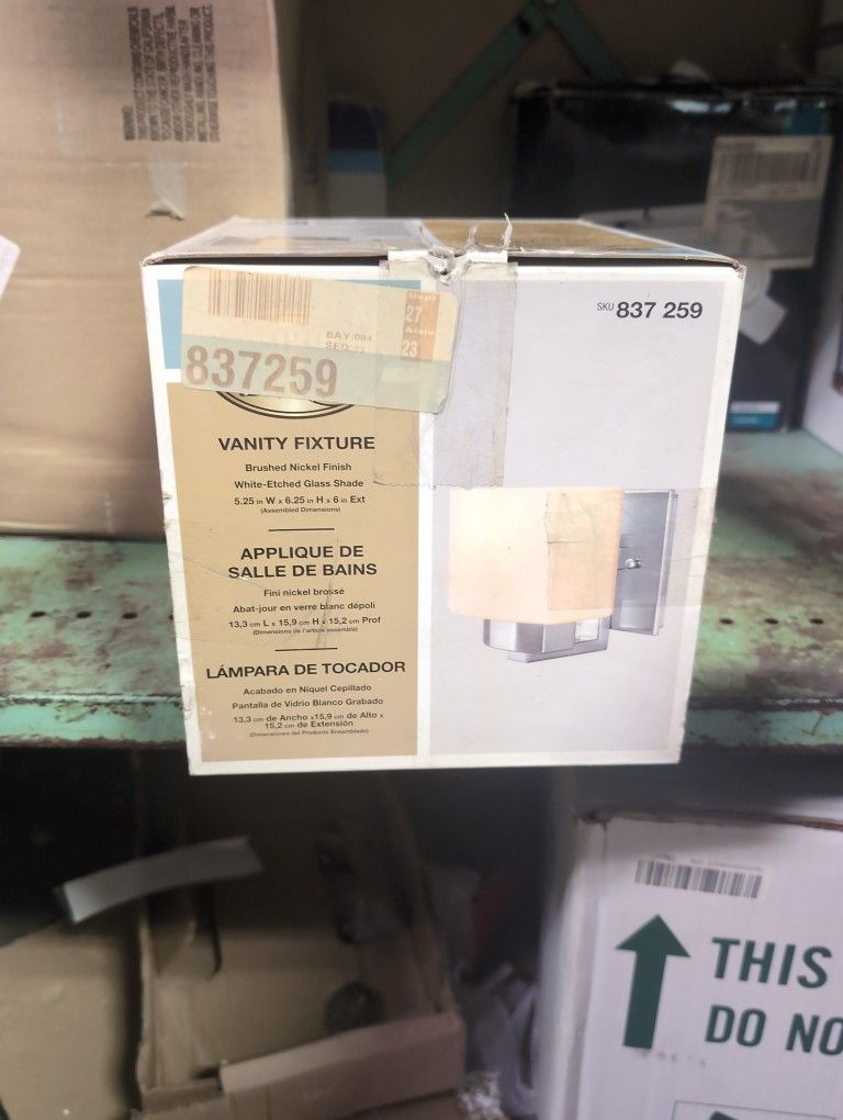 Vanity Fixture With A Brushed Nickel Finish