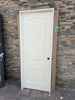 30 in. x 80 in. 2 Panel Left-Handed Primed Composite Solid Core Single Prehung Interior Door 4-9/16 in. Flat Jamb