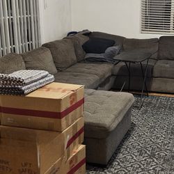Gray Couch Wth Pull Up Leg Rest