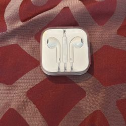 Apple wired earbuds in plastic