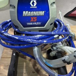 A Set Of Used Graco Magnum 262800 X5 Stand Airless Paint Sprayer