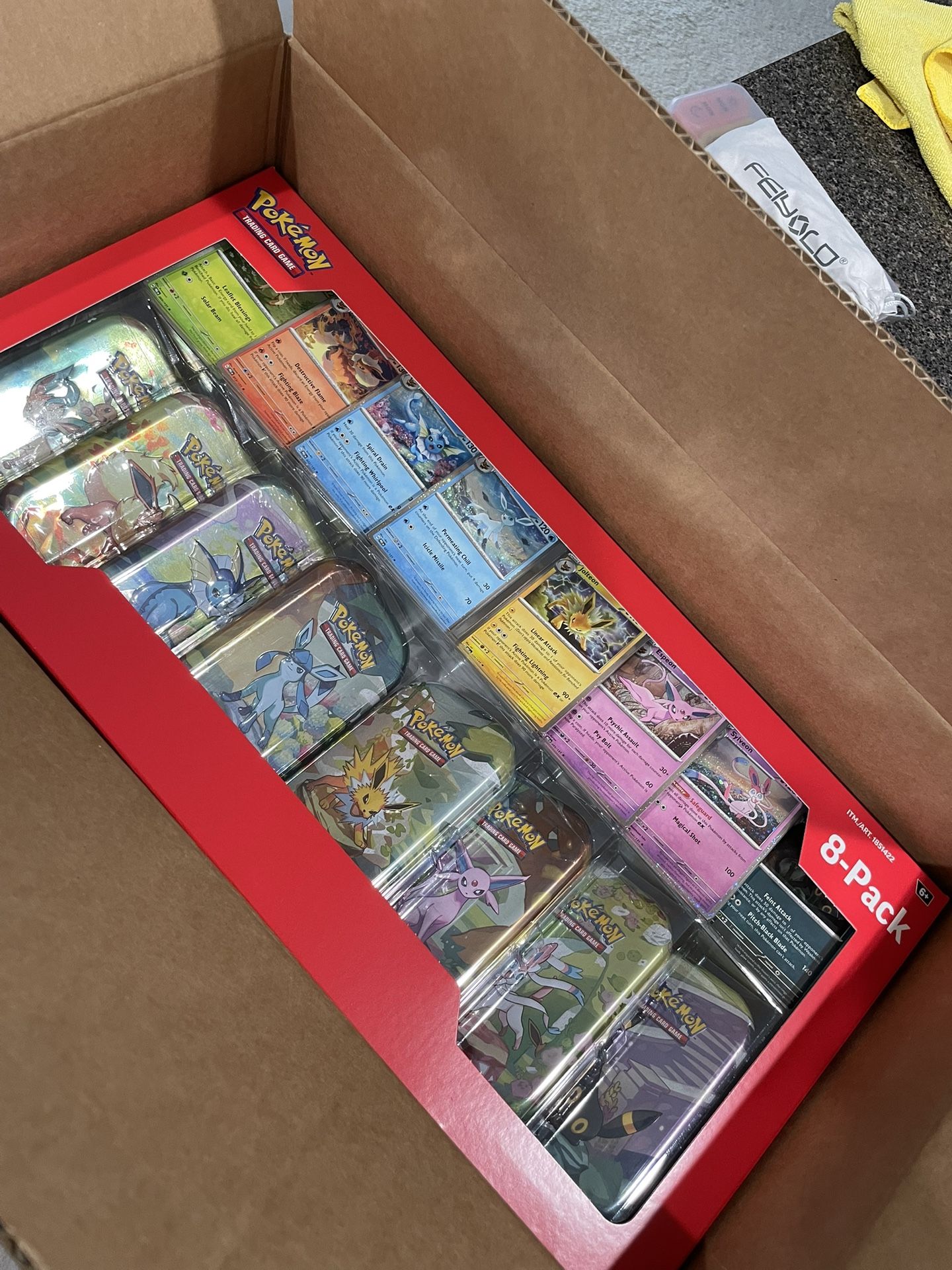 Pokemon Prismatic Costco 8 Pack Tins