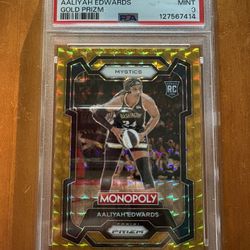 Aaliyah Edwards Gold Prizm Monopoly RC /49 PSA 9
