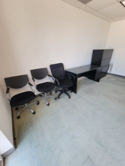 3 New Chairs. 1 Black Desk. 1 File Cabinet New