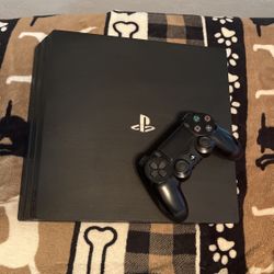 PS4 with controller 