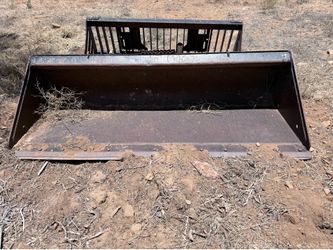 84” smooth CAT skid steer bucket
