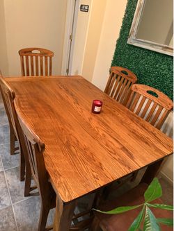 Wooden table with 6 chairs