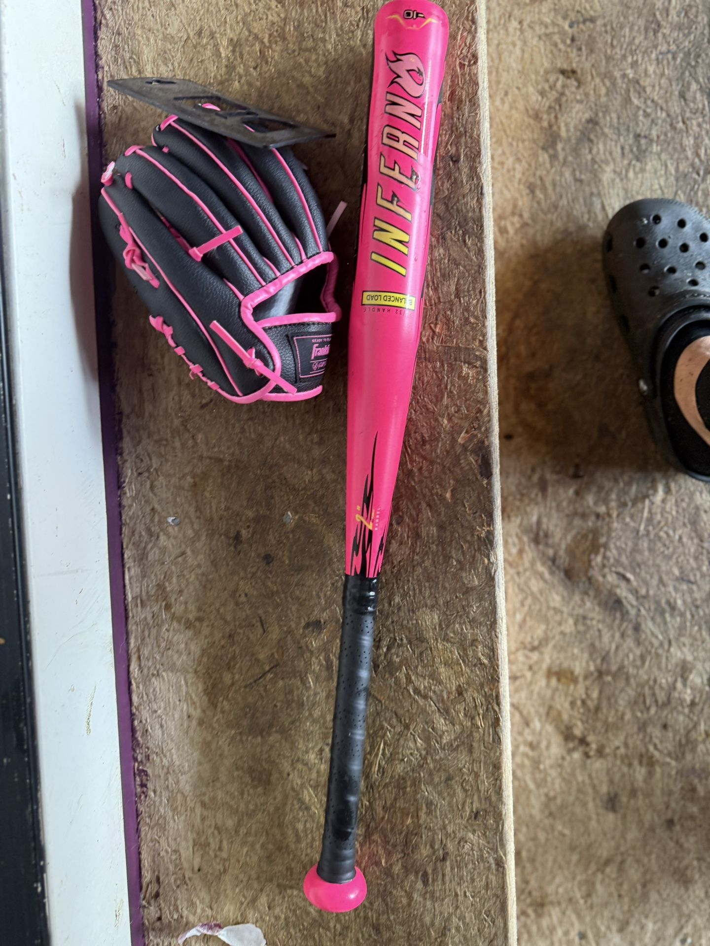 Small baseball bat and glove