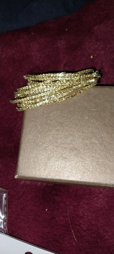 12 Piece Gold And Diamond Accent Bracelets