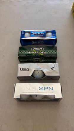 4 new sleeves of golf balls