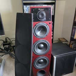 McIntosh LS340 loudspeaker. It features a high-quality red cherry finish