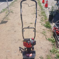 Craftsman C210 model.
Tiller. Used a couple of times works excellent.