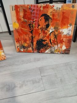 This artwork is a vibrant mixed-media collage painting