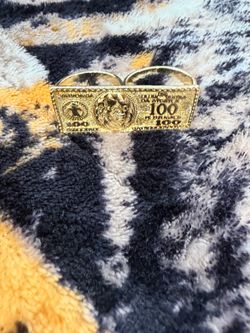 Dollar sign ring