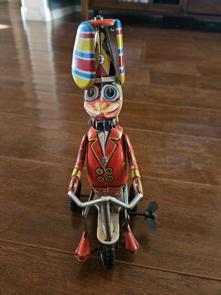 Vintage Metal Childs Windup Toy "Duck On Bike"