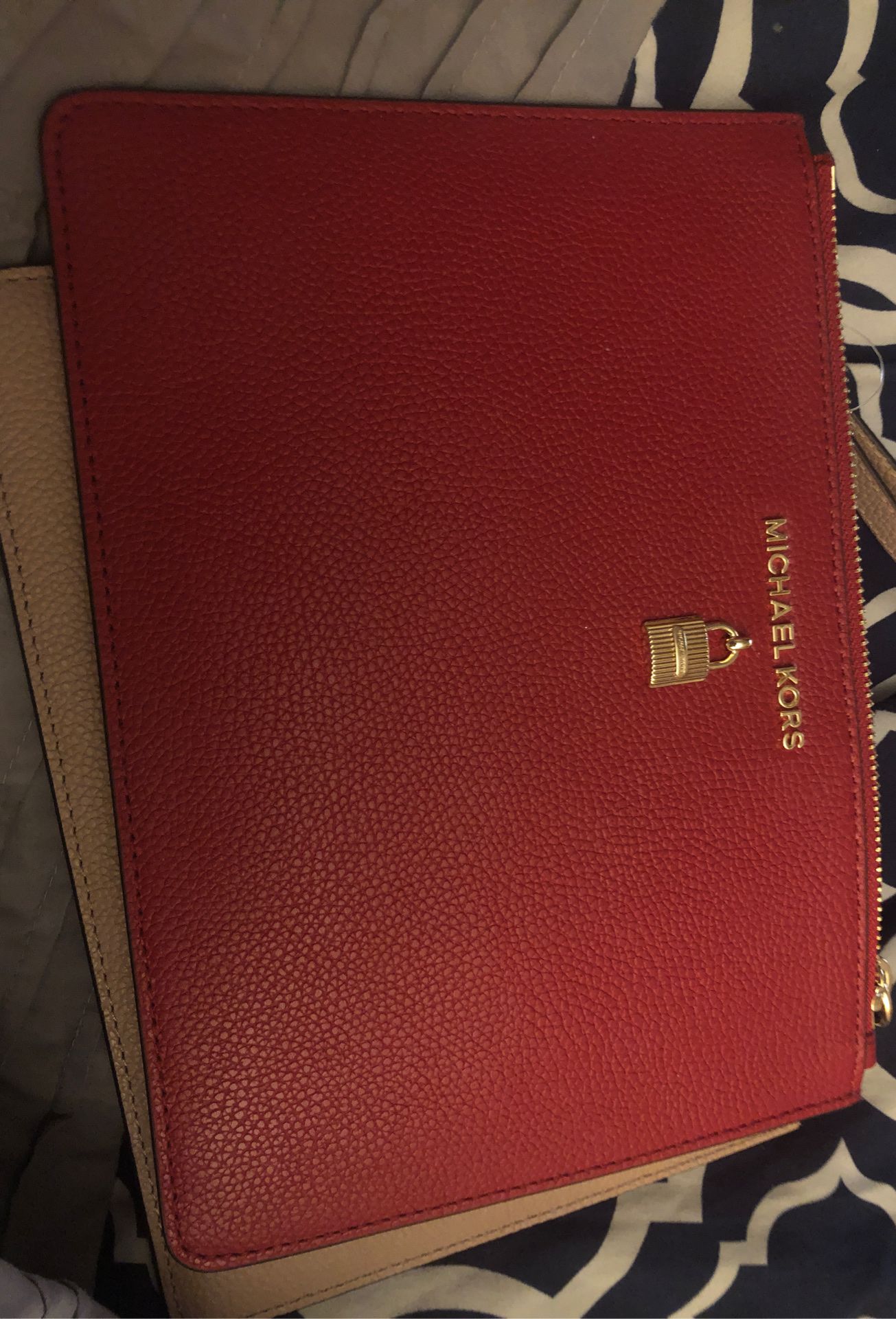 Red a Michael Kors wristlet