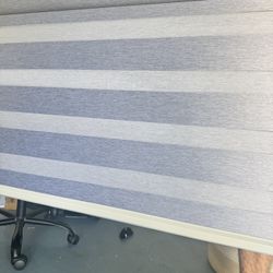 Brand new beautiful Windows roller Shades (46.8” W X 72” H, grey).