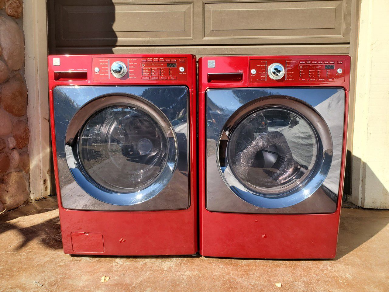 Beautiful red Front loading Kenmore Elite washer and dryer set
