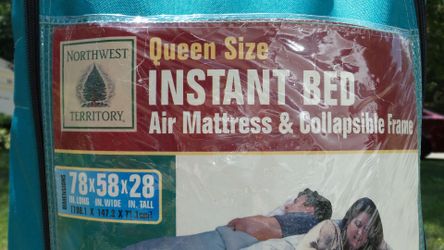 Queen-size  inflatable air mattress with stand.