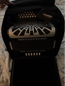 Black/silver Hohner accordion